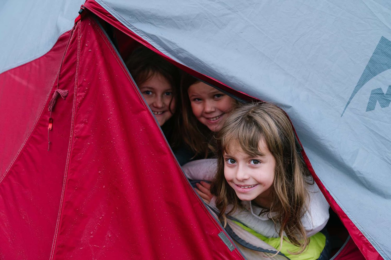 elementary school students in a tent