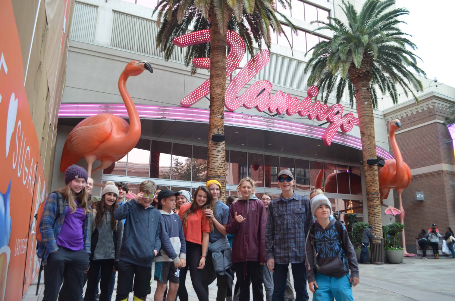students standing in front of the flamingo hotel and casino